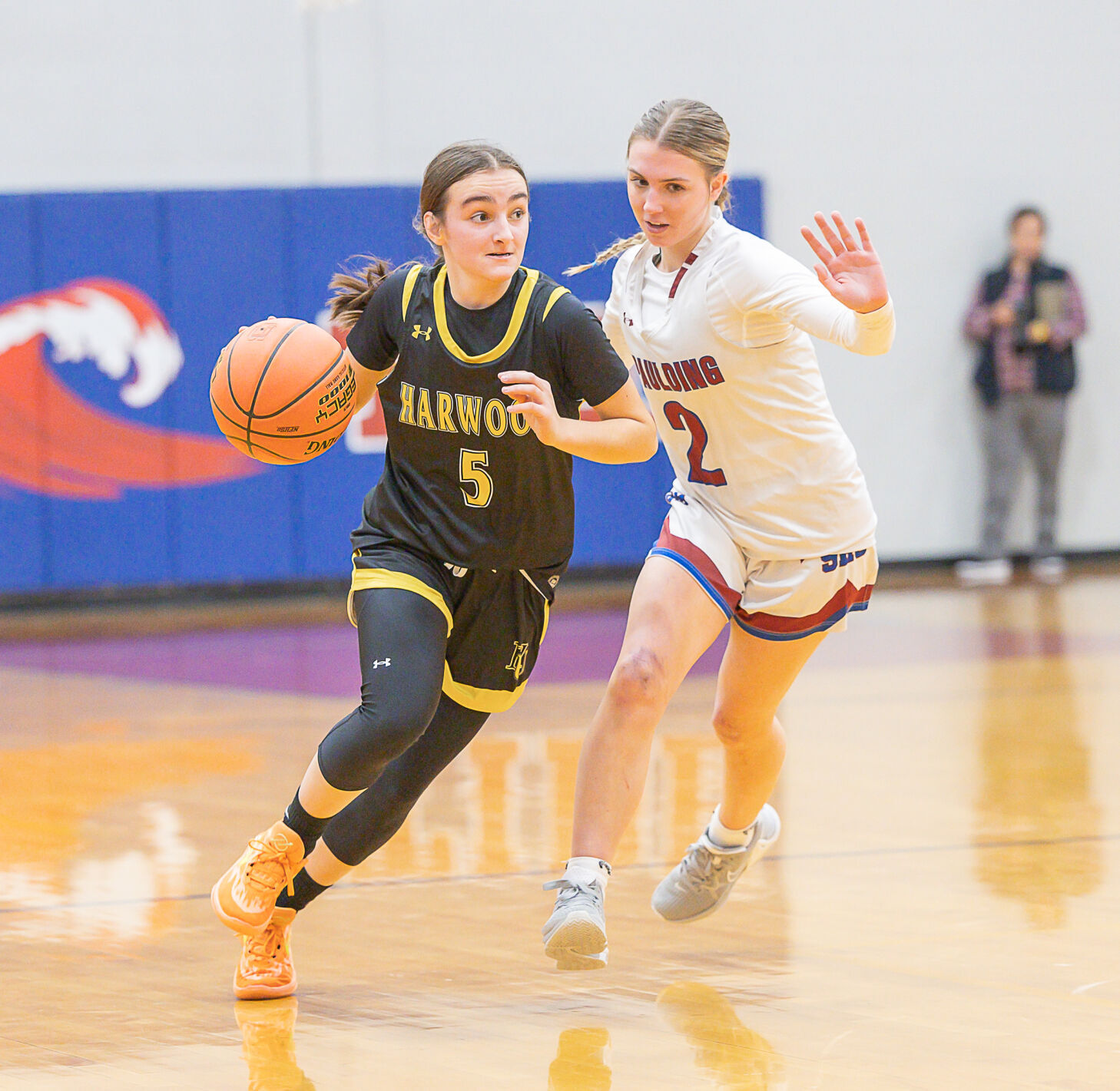 Roundup: Unbeaten Harwood downs Spaulding, 44-32